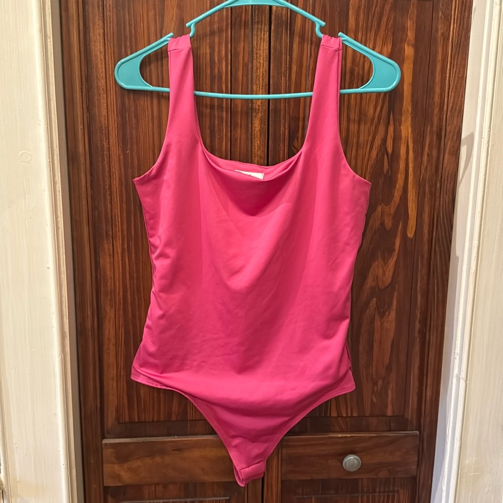 Hot pink bodysuit